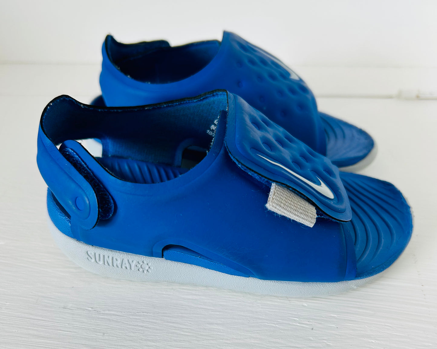 Blue Nike Sunrays size 4 baby